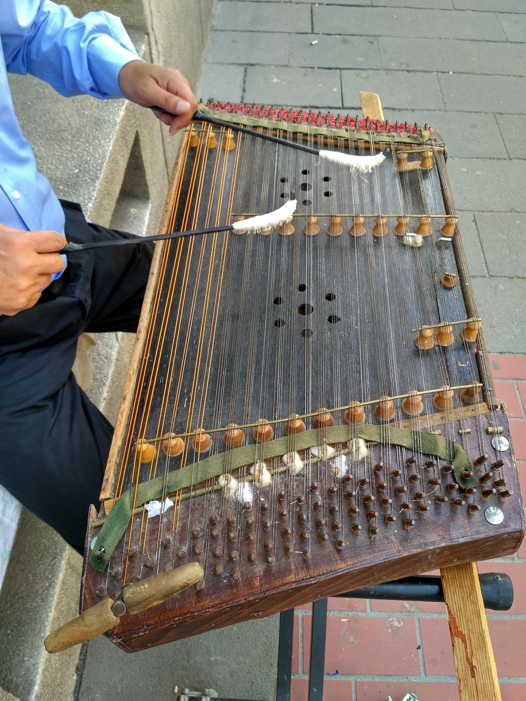 Cimbalom photographed in Bucharest, its strings and bridges visible in detail.